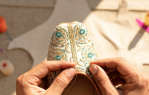 Artisan hand stitching an embroidered jutti — a traditional craft experience and one of the best things to do in Jodhpur thumbnail