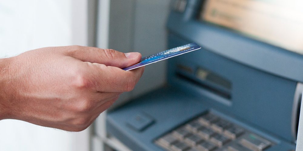 What is the cost of withdrawing money from ATMs in India using an international credit debit card 