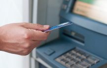 What is the cost of withdrawing money from ATMs in India using an international credit debit card 