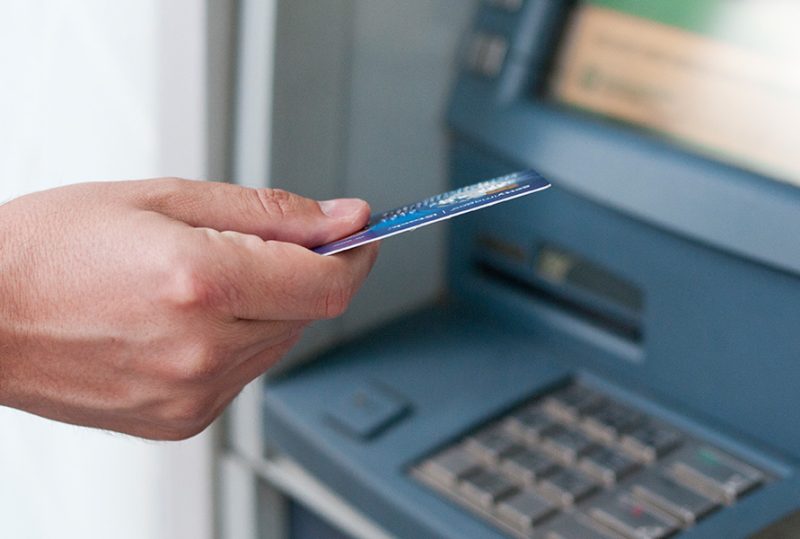 What is the cost of withdrawing money from ATMs in India using an international credit debit card 
