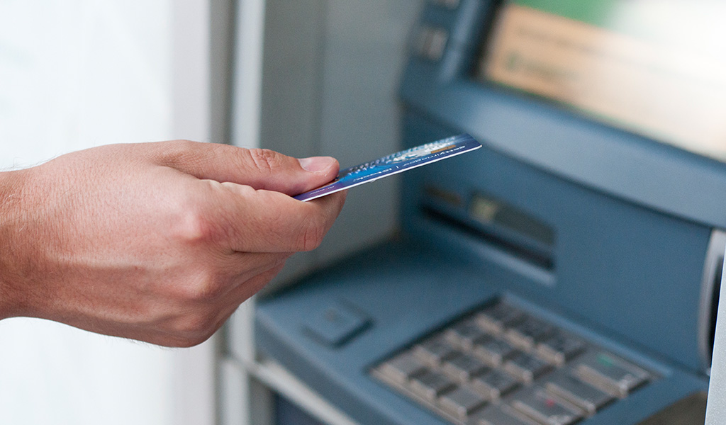 What is the cost of withdrawing money from ATMs in India using an international credit debit card