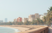Marine Drive promenade on a Mumbai itinerary — palm lined seafront walkway with the Arabian Sea and city skyline in the background thumbnail