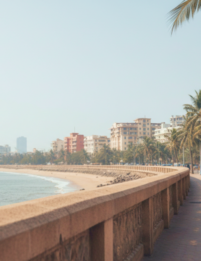 Marine Drive promenade on a Mumbai itinerary — palm lined seafront walkway with the Arabian Sea and city skyline in the background thumbnail