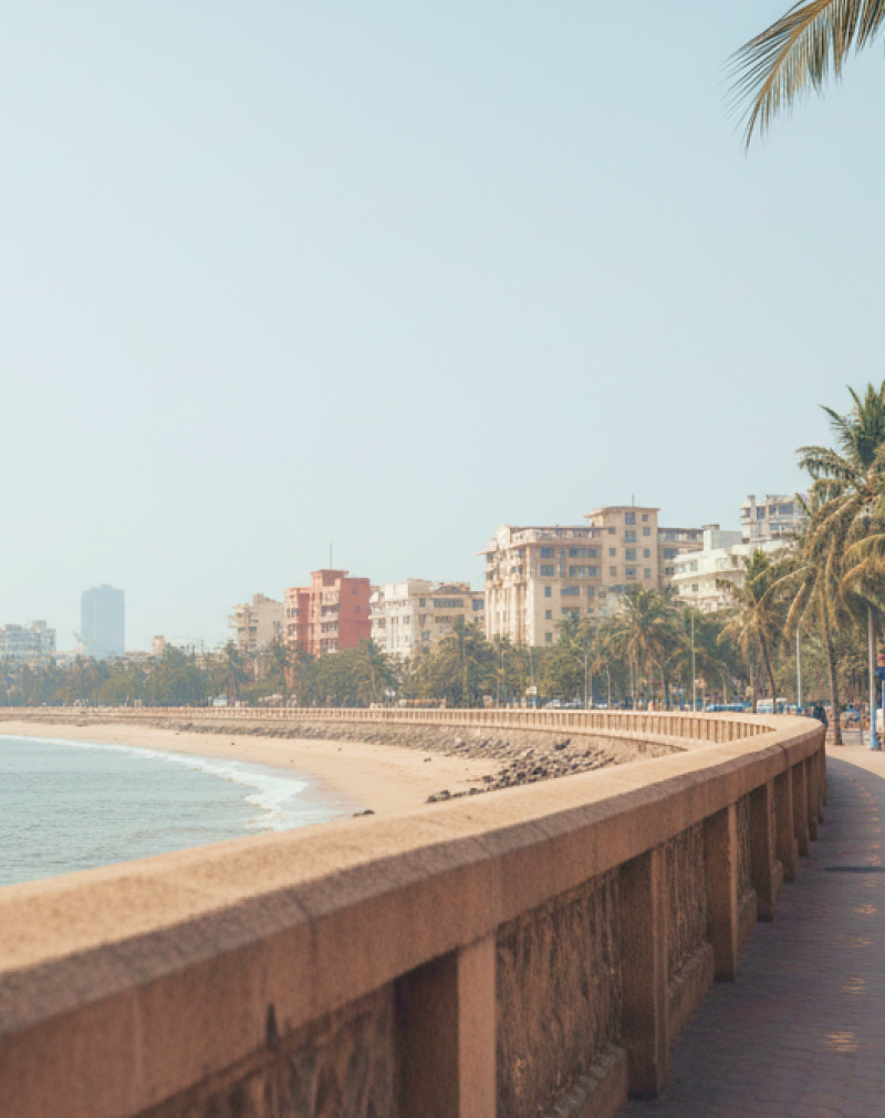 Marine Drive promenade on a Mumbai itinerary — palm lined seafront walkway with the Arabian Sea and city skyline in the background thumbnail