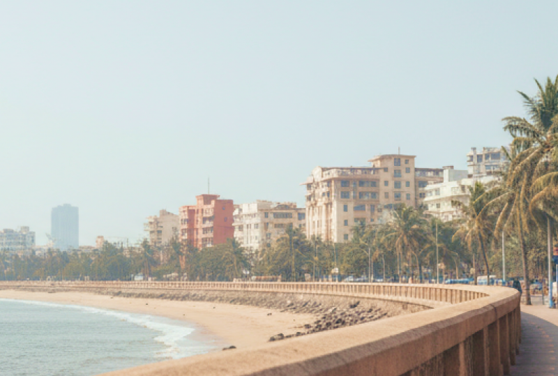 Marine Drive promenade on a Mumbai itinerary — palm lined seafront walkway with the Arabian Sea and city skyline in the background thumbnail