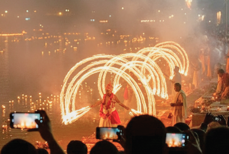 Experience Indian festivals as a tourist — Ganga Aarti fire ceremony in Varanasi during Diwali