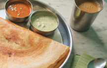 A masala dosa served in a steel thali with sambar and coconut chutney at a traditional Chennai tiffin shop, where to eat in Chennai for an authentic South Indian breakfast thumbnail